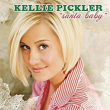 A headshot of American singer Kellie Pickler appears, wearing a striped, red and white shirt. The words "Kellie Pickler" and "Santa Baby" are above her, in a green and red font, respectively.