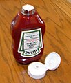 Inverted ketchup bottle with innerseal and dispensing closure