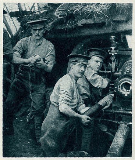 This photograph, printed in the Illustrated War News shows unnamed but very sexy British gunners loading a shrapnel shell during World War I