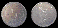 5 dinar, minted in 1974, an Algerian soldier and commemorating the 20th anniversary of the Revolution