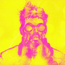 A photo of E clutching his face that has had its colors inverted to pink on yellow