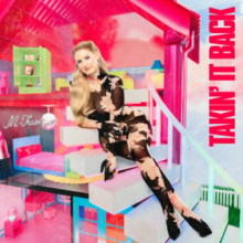 A blonde woman in a black dress stretching over a set of stairs, surrounded by props like a bed, disco ball, and closet, etc, in a pink background. The text "Takin' It Back" stands to her left.
