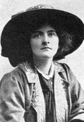 young white woman in large Edwardian hat