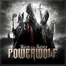 A wolf wearing a pope costume holding a papal ferula with two other wolves behind him in bishop costumes holding crosiers. The Powerwolf logo and the words "Blood of the Saints" along the bottom.