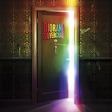 A door opening to reveal colorful light shining from the next room