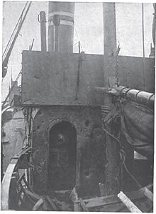 Picture of a drifter with shot holes throughout its bridge