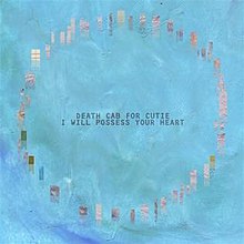 On a blue background, a circle of pixelated brown rectangles with the band and single names in the center