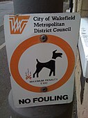 A sign in south Wakefield depicting the former council logo and branding