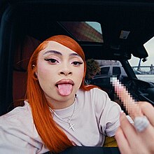 Cover art for "Think U the Shit (Fart)": Ice Spice sticking her tongue out and raising her middle finger to the camera