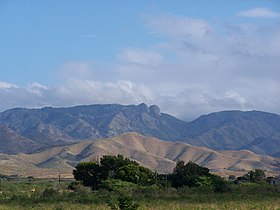 Las Tetas as seen from the south coast of Puerto Rico in the municipality of Coamo