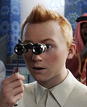A computer-illustrated, moderately realistic-looking image of Tintin, a screenshot from his new movie