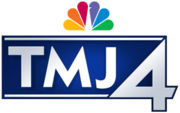 A stylized blue rectangle with white accents along its top and bottom. Between these accents, white capital text reading "TMJ" appears, without the "W" which is a part of the station's call letters. To its right, a larger numerical "4" appears, and centered above the "M" and the "J", the NBC Peacock logo appears.