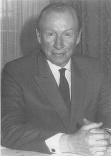 Black-and-white photography of a man in a suit
