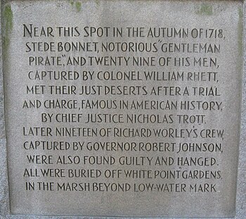 A carved stone monument, detailing the capture and trial of Bonnet and his men.