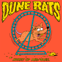 An orange rat running on a blue running wheel, looking at a small piece of cheese. The band's name is placed above in a cheese-like design and the album title is placed below in yellow.
