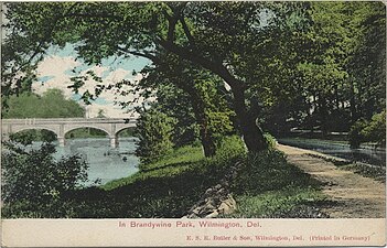 About 1905, looking downstream toward Van Buren Street Bridge, Wilmington. Note the mill race on the right.