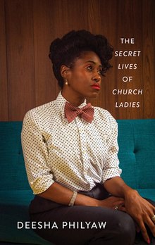 The cover depicts a Black woman sitting on a teal couch, looking off to her left with an expression of consternation. She wears a polka dot button up shirt and a red bowtie.