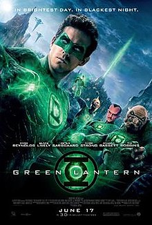 A human male member of the fictional Green Lantern Corps, with his glowing ring clearly in view, stands in front of a group of other alien members on an alien planet, while a green light beaming from a building structure stands in the background.