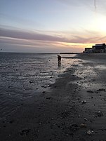 Silver Sands Beach at sunset in Milford