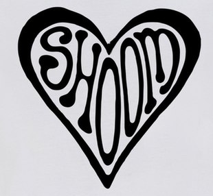 Shoom's logo which comprises the name of the club written in a font influenced by 1960's Psychedelic art, around which is a border in the shape of a love-heart. This is a black-and white version, but it came in other colour combinations