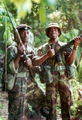 Jamaica Defence Force soldier with a sergeant of the Bermuda Regiment in the Blue Mountains of Jamaica.