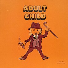 A cartoon drawing of a man with cane and a cigar wit the words "Adult Child" written above it. The cover has an orange background