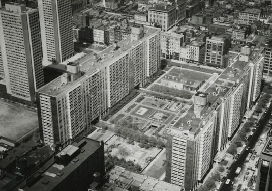An aerial view of Washington Square Village (Notice this image looks southwest; the illustration on the left, of the planned three building construction, looks northeast.)