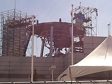 Construction of an hourglass to be used as the set for an American quiz show.