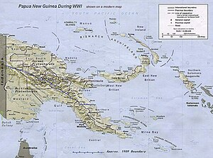 Relief map of New Guinea showing mountains, and locations of various settlements: the area of Kaiser–Wilhelmsland is approximately a quarter of the entire island.