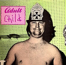 An saturated image of Brian Wilson in a fire hat on with the words "Adult Child" written in a pink box next to him
