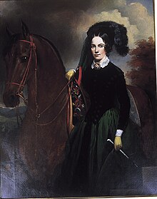 A portrait of a woman standing next to a horse.
