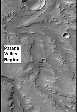 CTX context image for next image that was taken with HiRISE. Note long ridge going across image is probably an old stream. Box indicates area for HiRISE image.