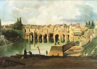 landscape showing distant town with bridge over a river