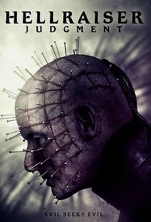 A side-view of Pinhead's face, centered and superimposed on a blurred background patterned after the Lament Configuration