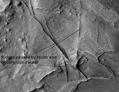 Huo Hsing Vallis Ridges, as seen by HiRISE. Ridges may be caused by water moving along faults.