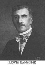 Head shot of a middle-aged man with moustache and bow tie.