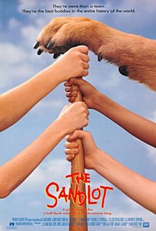 Four children hold a baseball bat with the paw of a dog resting on the top of it. The film's tagline on top reads "They're more than a team. They're the best buddies in the entire history of the world". Below the film's title, another tagline reads "A Piece of Paradise a half block wide and a whole summer long".