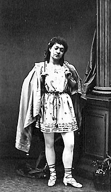 photograph of young woman in a male Ancient Greek costume