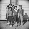 Front row: Hideko Kimoto, Marianne Nosui, Aki Sakuma, Tadako Yoshwaru, George Fujii. Back row: Hidio Zumo. The legal staff at Camp 1 of the Poston Center, photographed on January 4, 1943.