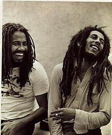 Miller (left) with Bob Marley