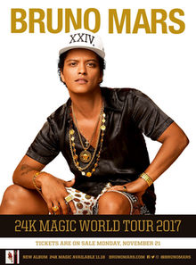 Shot of Mars wearing a white cap and black shirt alongside necklaces and other jewelry. He stands against a white backdrop, while his name and information on the tour is superimposed at the top and bottom of the poster.