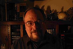 Author Wm. Mark Simmons in his study in 2007