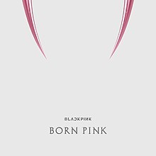 Cover artwork of Born Pink – a pair of pink fangs are displayed on top against a white background. Below are text reading "BLɅϽKPIИK" and "BORN PINK".