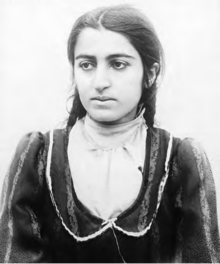 Young Armenian woman looking to the side