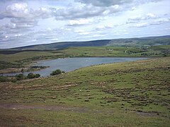 View from Brown Wardle looking out over Watergrove Reservoir, formerly the site of the town of Watergrove.